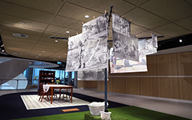 Clothes line hung with cloth photographs