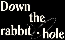 White text spelling 'Down the rabbit hole' scattered across a black background