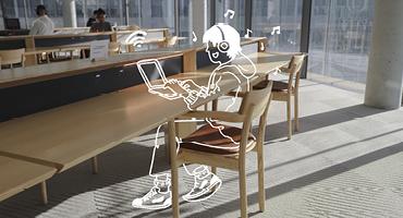 Chair with cartoon student sitting at desk