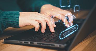 Hands at laptop
