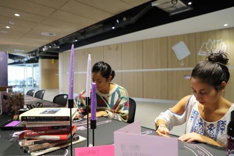 Students quietly making tarot cards at THE BIBLIOMANCY FEAST