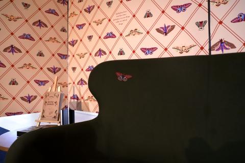 Vita's moth embroidered onto a couch