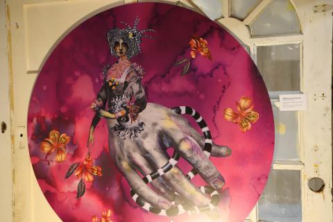 Deborah's pink creation, featuring a women with the body of a hand 