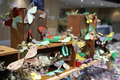 Paper moth-making at the Library