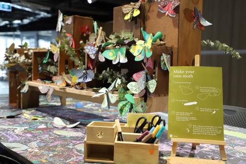 Paper moth-making at the Library