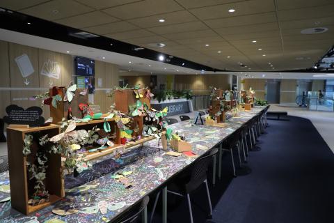 Paper moth-making at the Library