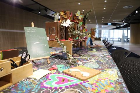 Paper moth-making at the Library