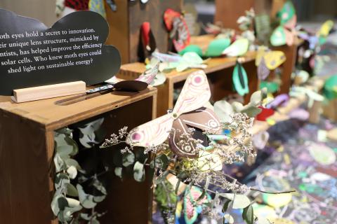Paper moth-making at the Library